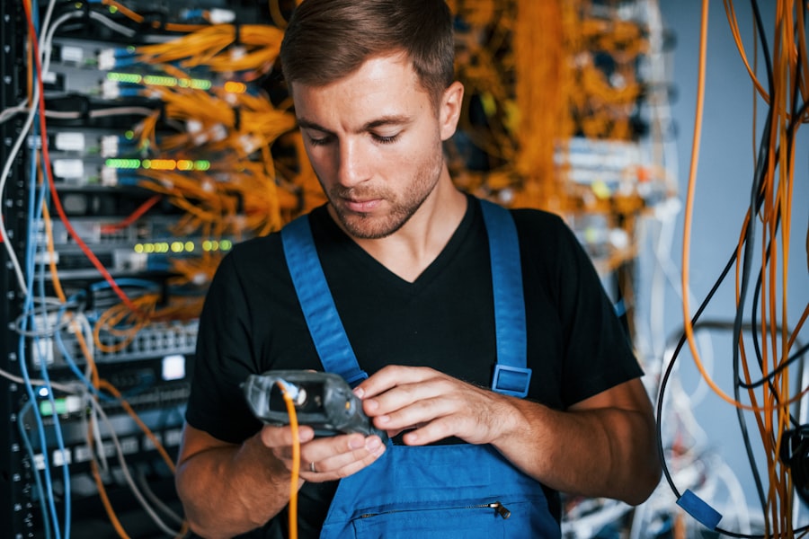 Technician installing telecommunications systems